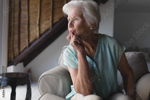 Senior woman relaxing in living room