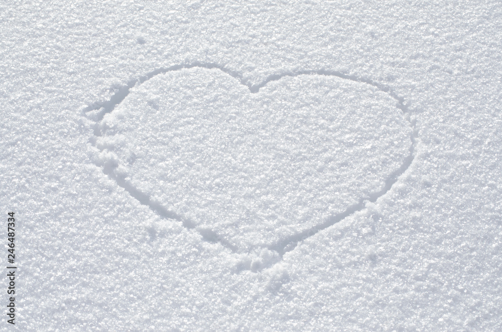 Heart drawn on snow, valentines day concept Heart drawn on snow, valentines day concept