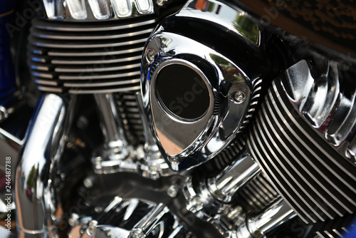 Motorcycle engine assembly, shiny chrome, closeup, angled © RobertCoy