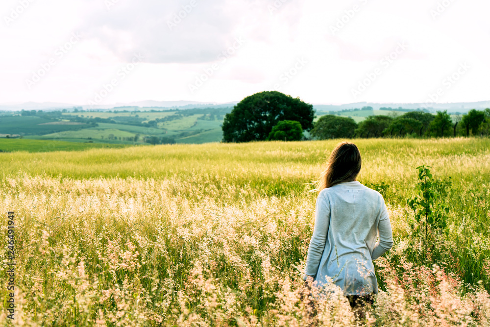 young woman admiring the landscape.