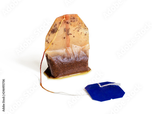 Used tea bag made of special filter paper, isolated on white background