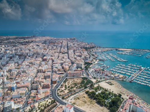 Aerial photo of harbour, residential houses, highways and Mediterranean Sea of Torrevieja. High angle view famous popular travel destinations for travellers. Costa Blanca. Alicante province. Spain 4