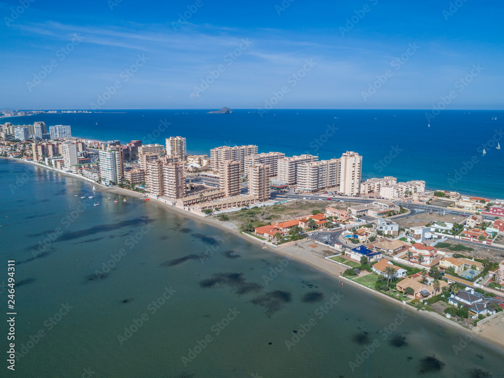 Aerial photo of tall buildings and the beach on a natural spit of La Manga between the Mediterranean and the Mar Menor, Cartagena, Costa Blanca, Spain 4