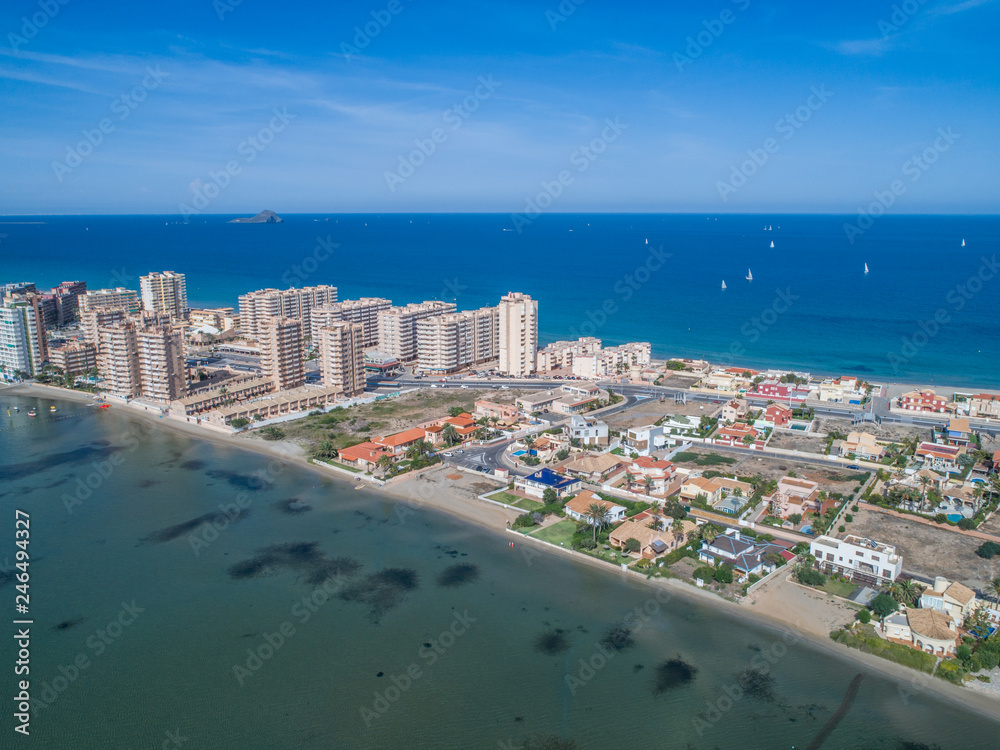 Aerial photo of tall buildings and the beach on a natural spit of La Manga between the Mediterranean and the Mar Menor, Cartagena, Costa Blanca, Spain 5