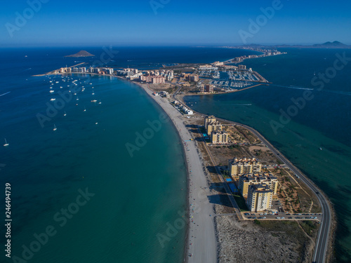 Aerial photo of tall buildings and the beach on a natural spit of La Manga between the Mediterranean and the Mar Menor, Cartagena, Costa Blanca, Spain 14