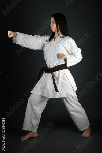 Young Woman Practicing with Karate Martial Art