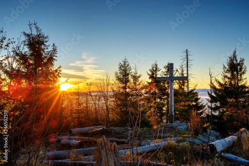 Peak cross on top of Siebensteinkopf, sunrise, near Finsterau, Bavarian Forest National Park, Lower Bavaria, Bavaria, Germany, Europe photo
