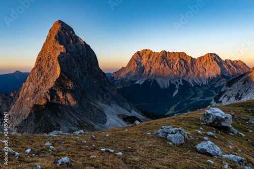 Summit of the Sonnenspitze with Zugspitze in the background at evening light, Ehrwald, Ausserfern, Tyrol, Austria, Europe