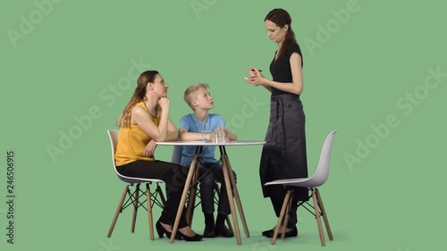 Woman and teenager boy are sitting in cafe and make an order to the waiter. Transparent background