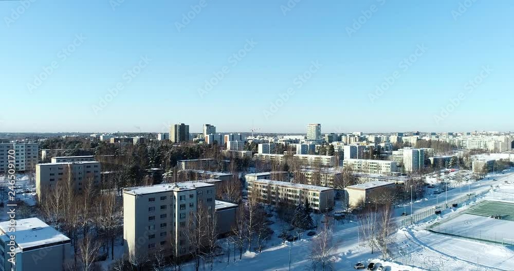 Espoo Finland, Flying up over an area of concrete panel buildings on a winter day Espoo Finland, Flying up over an area of concrete panel buildings on a winter day