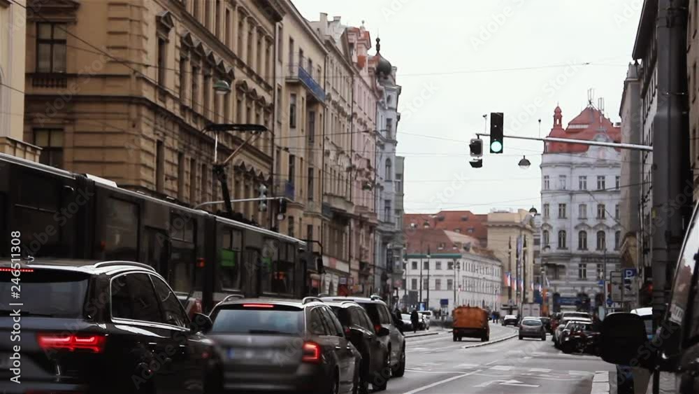 Traffic Light Just Changing from Red to Green on a Crowded Street in the Center of Prague, Czech Republic. Slow Motion.