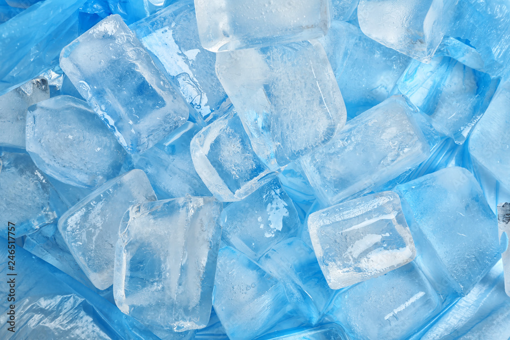 Many ice cubes on color background, top view Many ice cubes on color background, top view