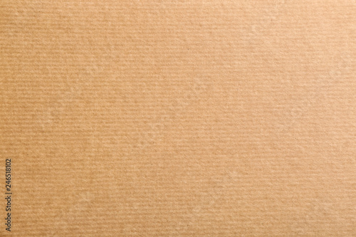 Sheet of kraft paper as background, top view. Recycling concept