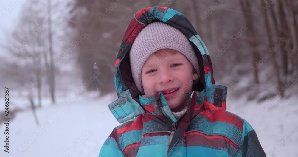 Young Caucasian Boy In The Morning When It's Snowing.