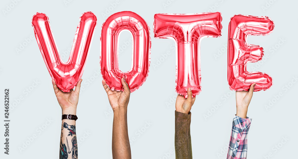 Hands holding vote word in balloon letters Hands holding vote word in balloon letters