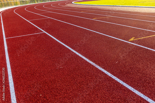 Red running track in stadium © Sawai Thong