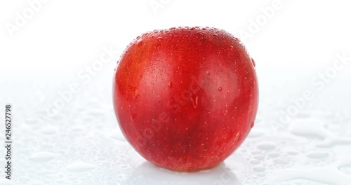 rotating red apple on white background
