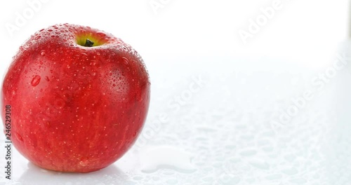 rotating red apple on white background