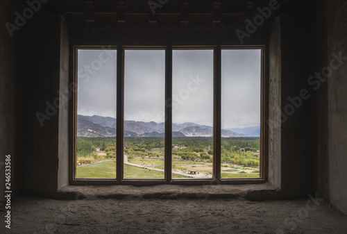 Empty window looking out into the landscape scenery of Leh Ladakh