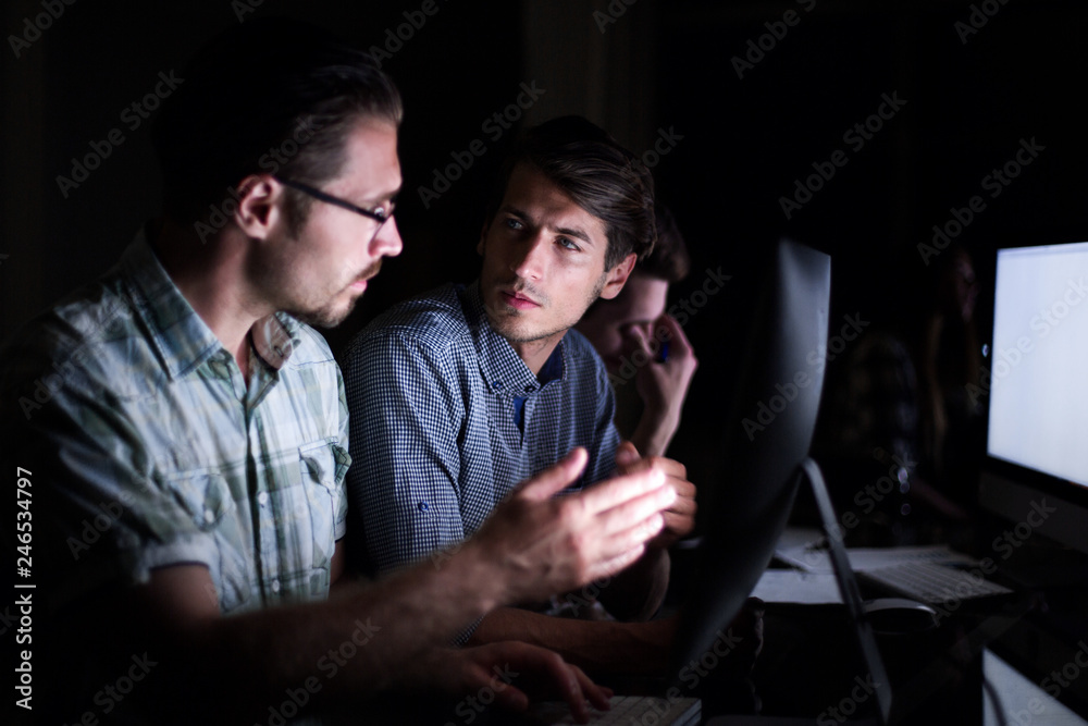 close up.two employees in the workplace close up.two employees in the workplace