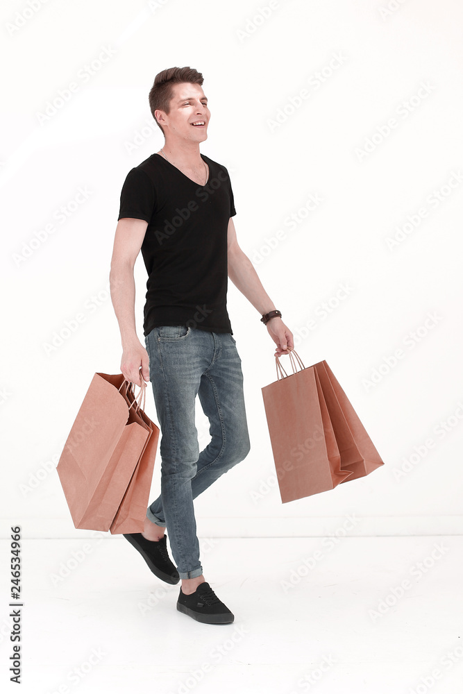 Handsome man in a black T-shirt with a bag Handsome man in a black T-shirt with a bag