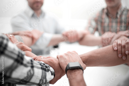 background image.business team standing in a circle