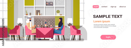 arabic couple sitting cafe table romantic dinner happy valentines day celebration concept arabic man woman love dating modern restaurant interior horizontal copy space