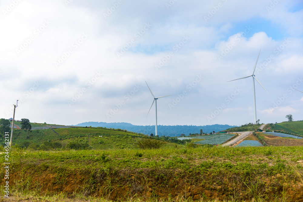 Windmill turbine field for electric production at Khao Kho, Petchabun, Thailand Windmill turbine field for electric production at Khao Kho, Petchabun, Thailand
