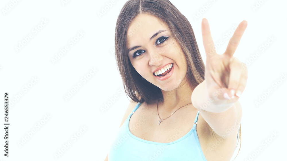 Beautiful young woman posing and showing two thumbs up Beautiful young woman posing and showing two thumbs up