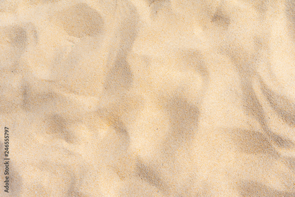 Fine beach sand in the summer sun Fine beach sand in the summer sun