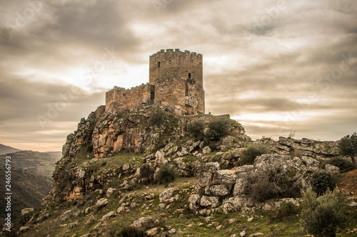 Obraz na plátne Medieval castle on a cliff on a cloudy day, Algoso, Vimioso, Miranda do Douro, B