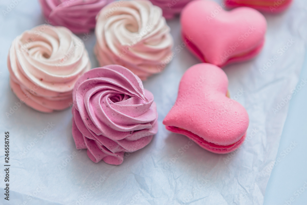 handmade marshmallows in pink and white are lying on the table in close-up. place for text, postcard handmade marshmallows in pink and white are lying on the table in close-up. place for text, postcard