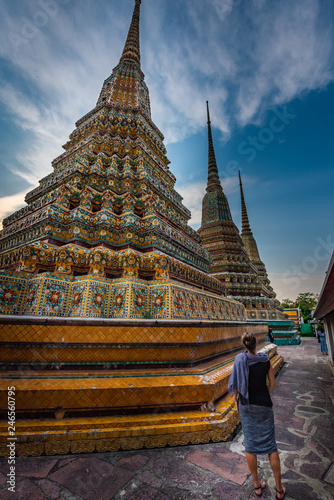 Woman Tourist admires Wat Pho Temple Bangkok Thailand