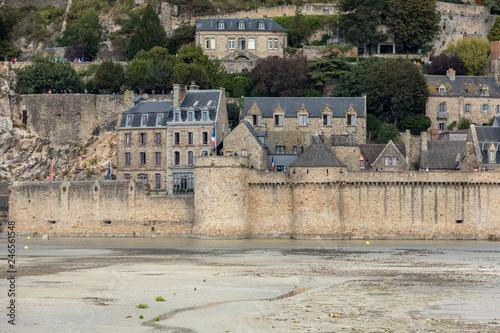 Le Mont Saint-Michel, medieval fortified abbey and village on a tidal island in the Normandy, France, at low tide