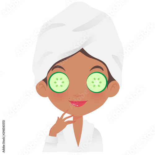 black girl spa wearing cucumber mask