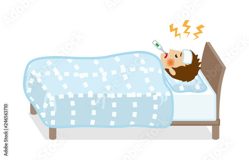 Teenage boy rest in bed who suffers fever of disease - Full length
