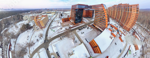 Panorama of a large building with laboratories and innovative projects, technical inventions in the Technopark of the Novosibirsk academic campus on a winter day. Aerial view. photo