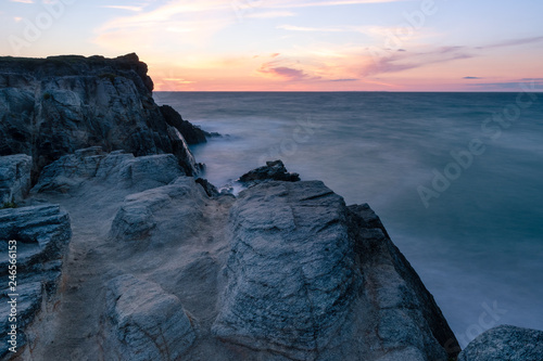 French landscape - Bretagne. A beautiful coast with rocks at sunset.