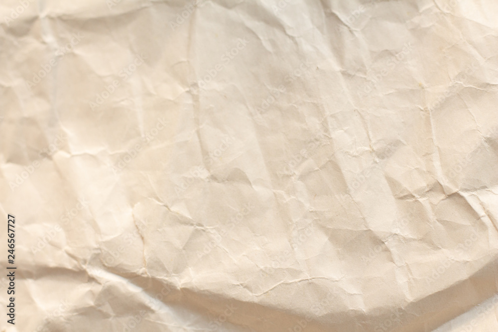 Fototapeta premium Light brown crumpled paper texture for background.backdrop for art work design or add text message.