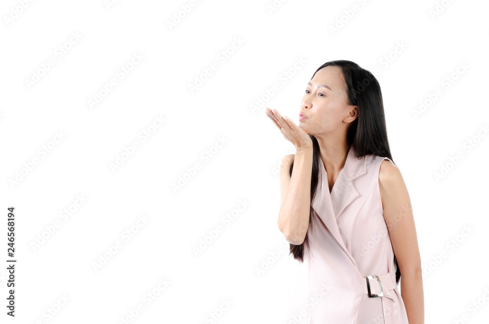 Asian woman with lovely expression face and acting as sending kiss and love to someone. Asian woman with lovely expression face and acting as sending kiss and love to someone.