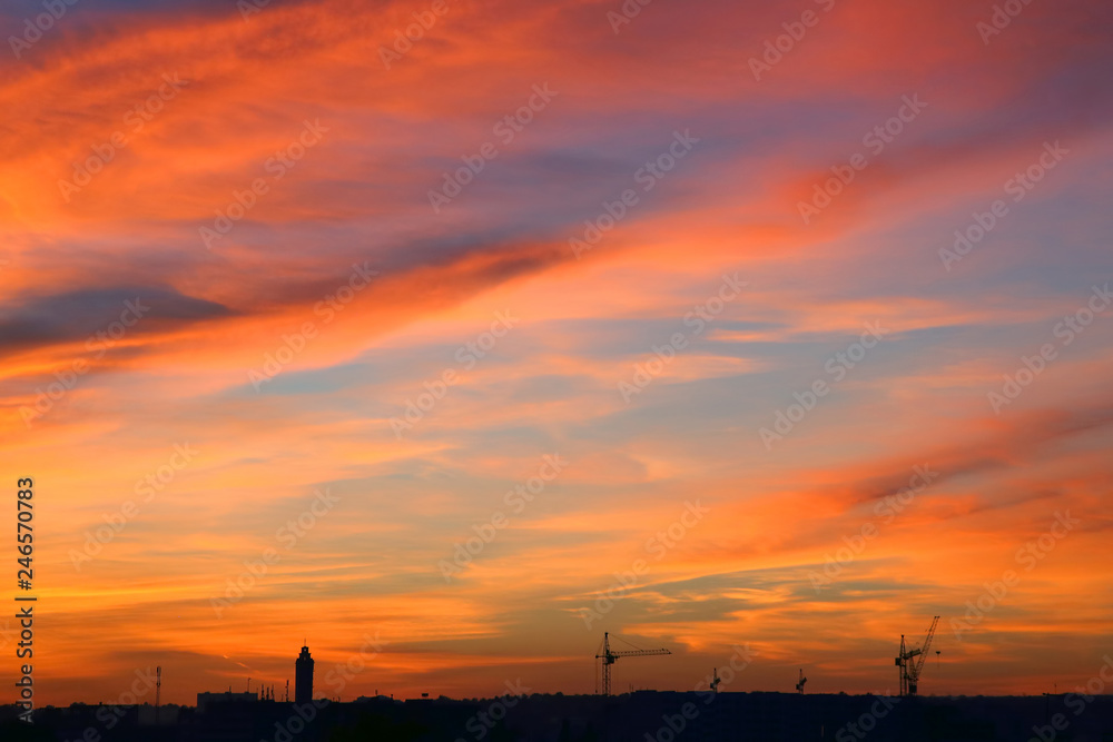 very bright sunset over the city very bright sunset over the city