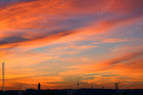very bright sunset over the city © photosaint