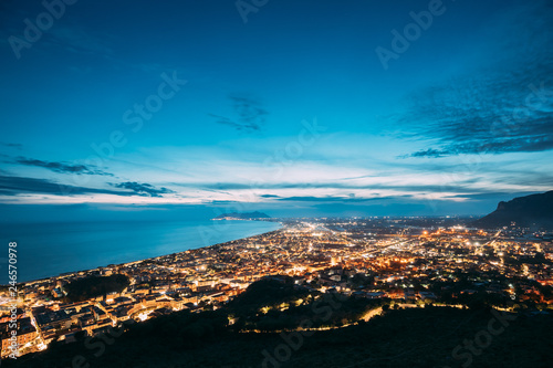 Terracina, Italy. Top Cityscape In Evening Night Illuminations