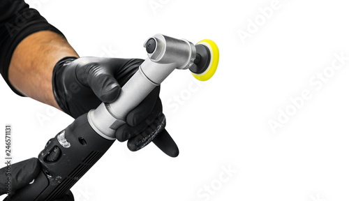 Car polish wax worker hands holing polishing tools isolated on white background. Buffing and polishing car concept. Man holds a polisher in the hand and polishes.