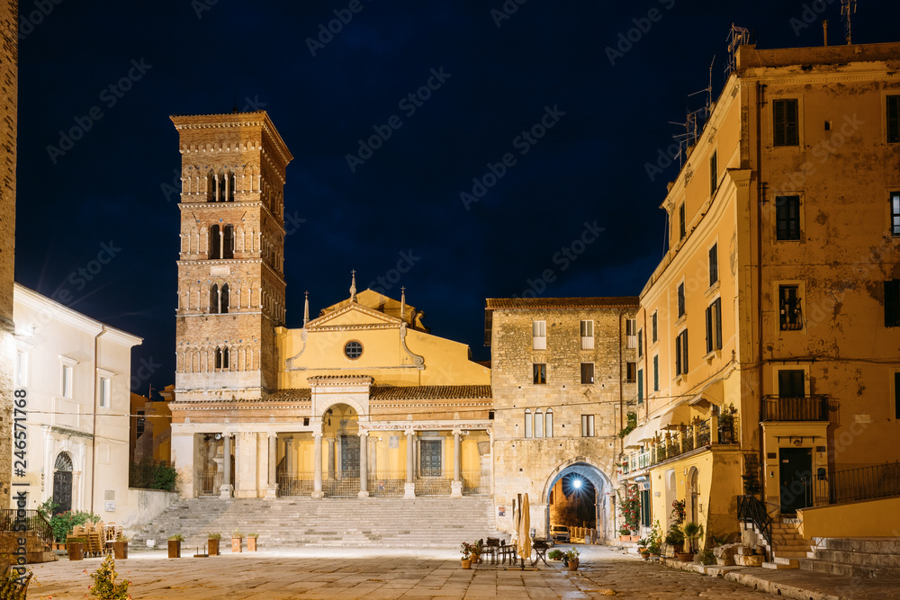 Terracina, Italy. Tower Of Cathedral Of San Cesareo In Night Time. It Built On Podium Of Temple Of Roma And Augustus