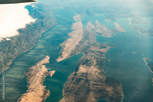 Croatia. Aerial View Of Island Pag In Adriatic Sea From Window Of Plane