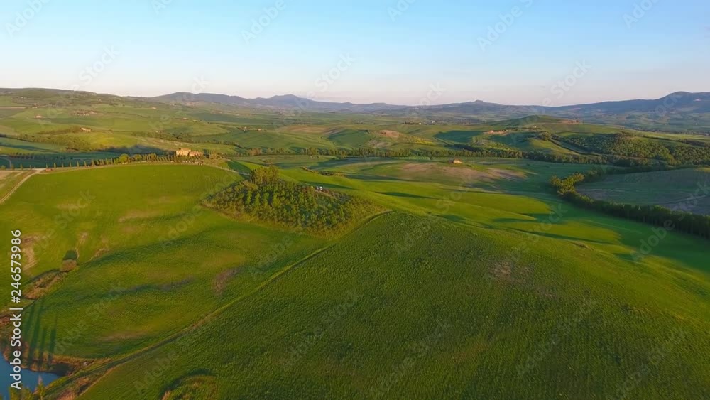 Tuscany aerial landscape of farmland hill country at evening. Italy, Europe, 4k Tuscany aerial landscape of farmland hill country at evening. Italy, Europe, 4k