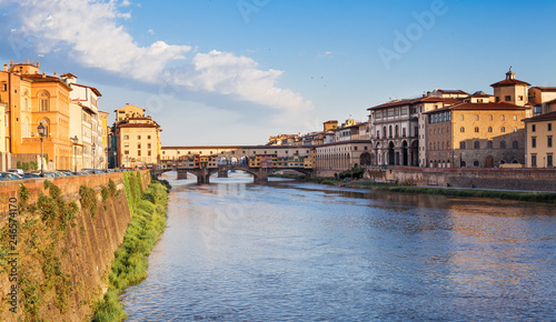 Florence cityscape. Famous bridge Ponte Vecchio over Arno river in Florence, Italy