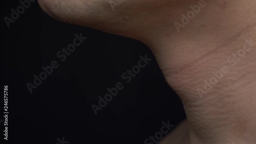 man gulp Adam's apple close up sequence