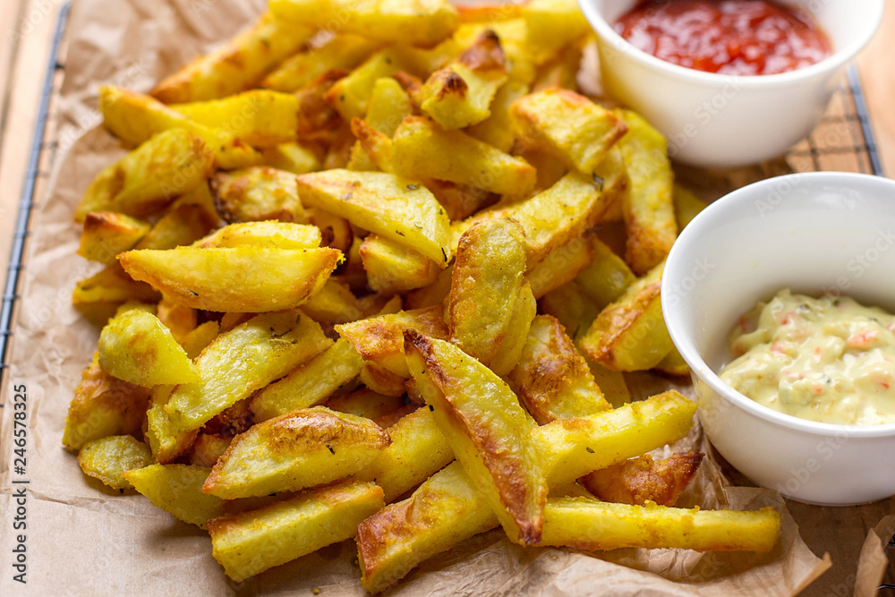 Healthy oven baked French fries with turmeric and curry spices Healthy oven baked French fries with turmeric and curry spices